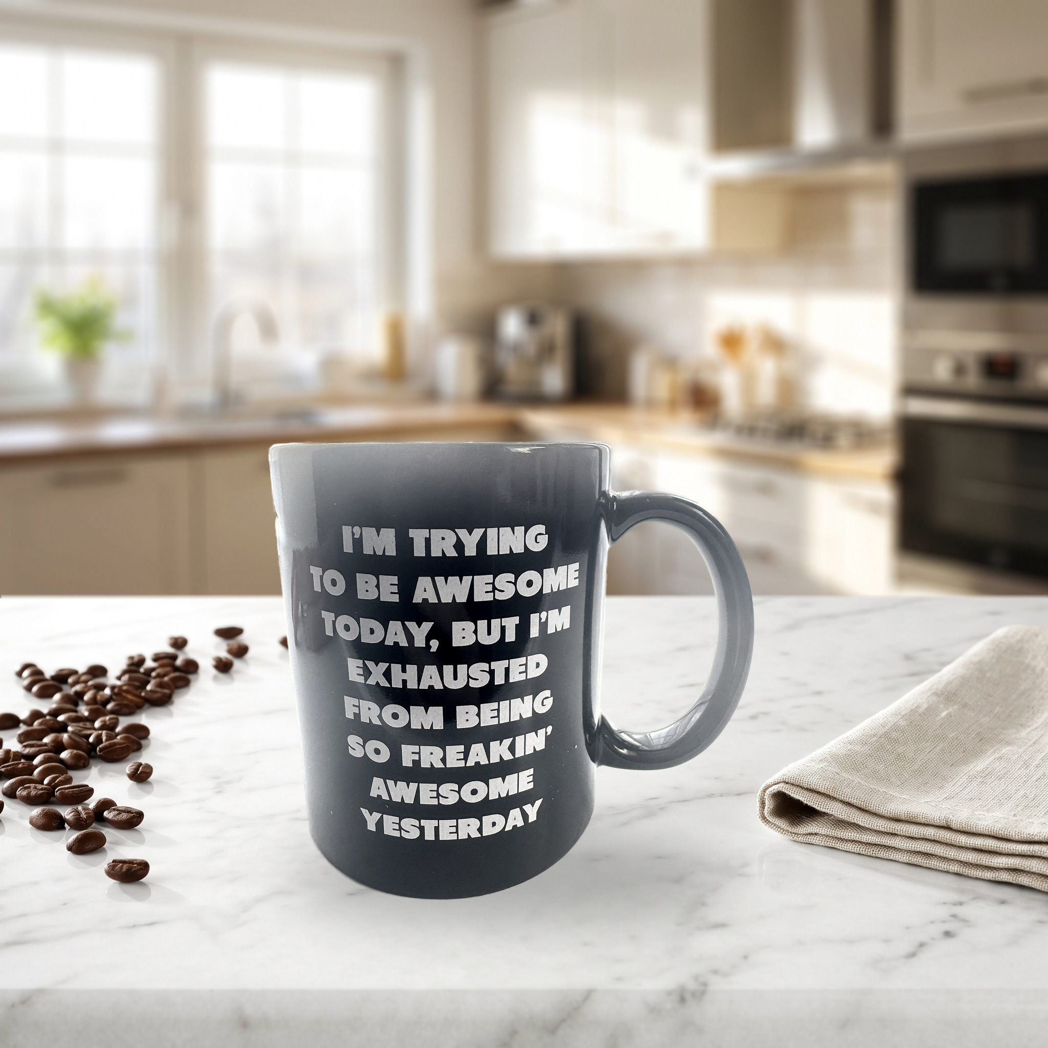 The mug on a marble kitchen counter with coffee beans